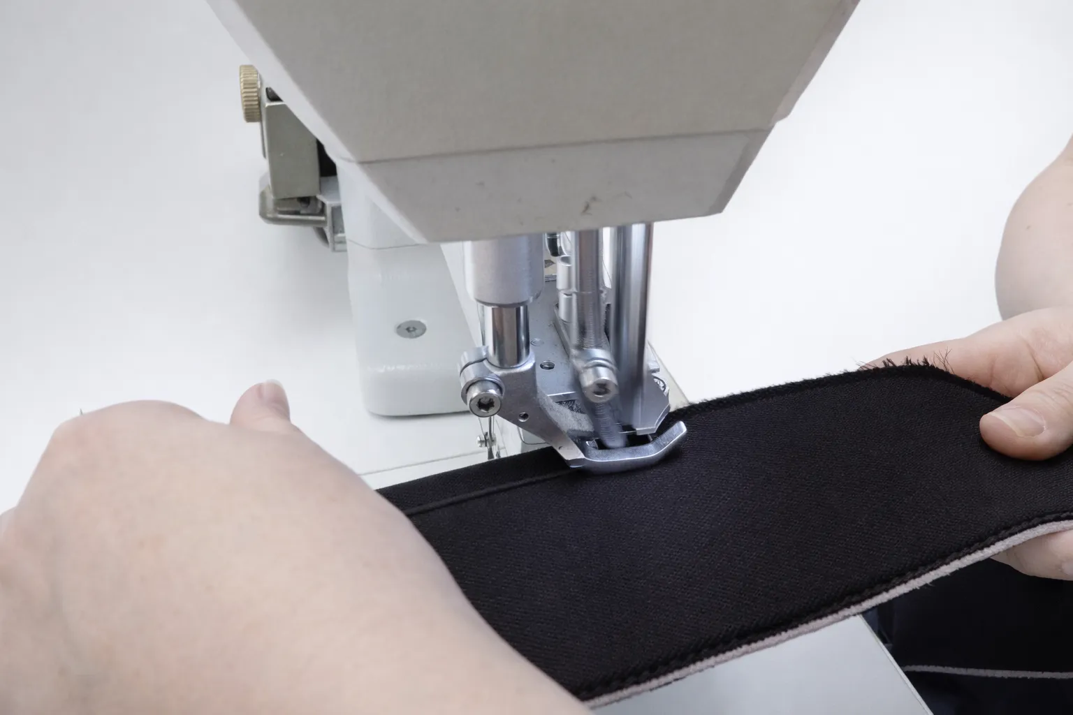 Manual sewing of textile