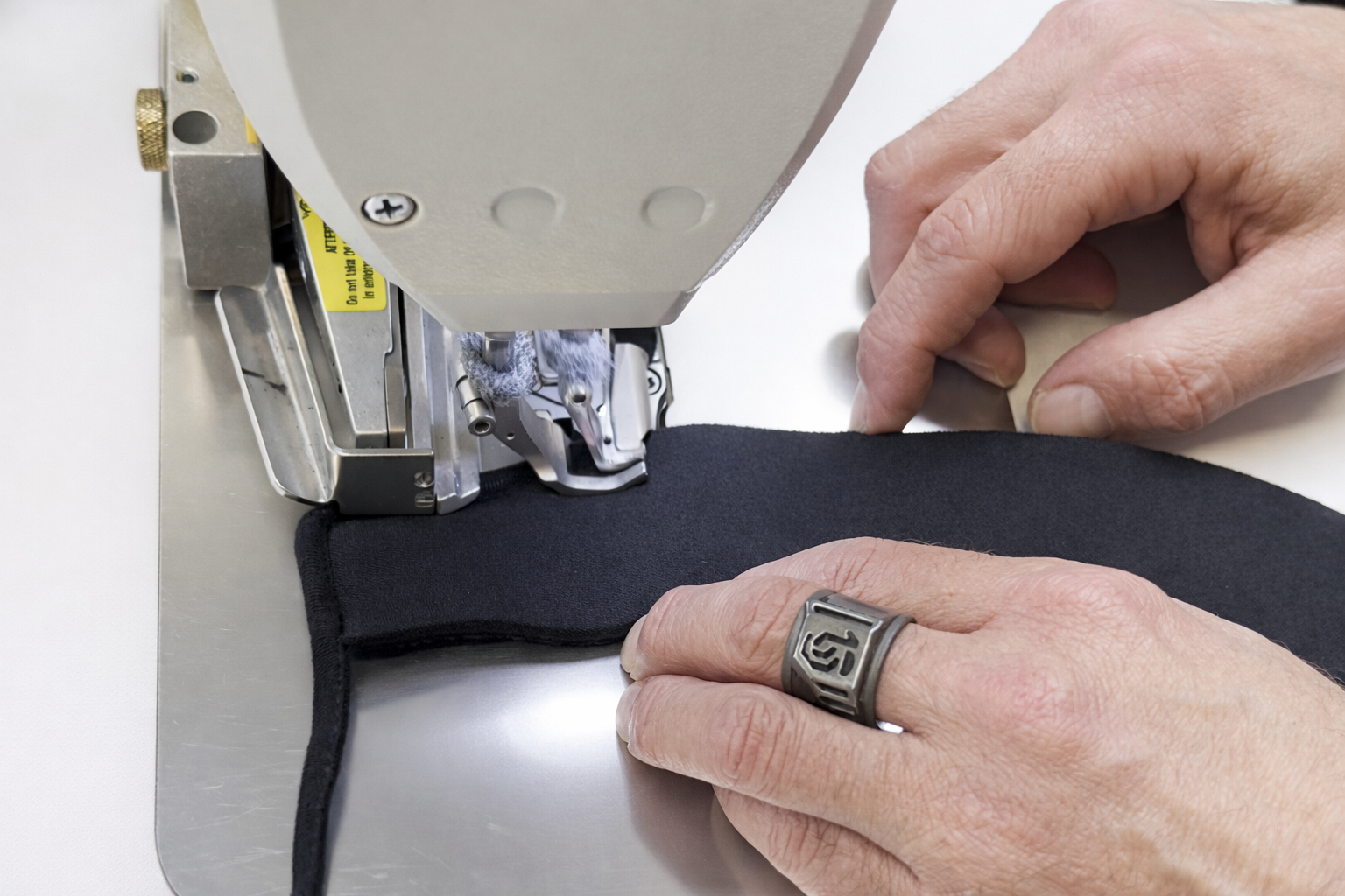 Manual sewing of textile