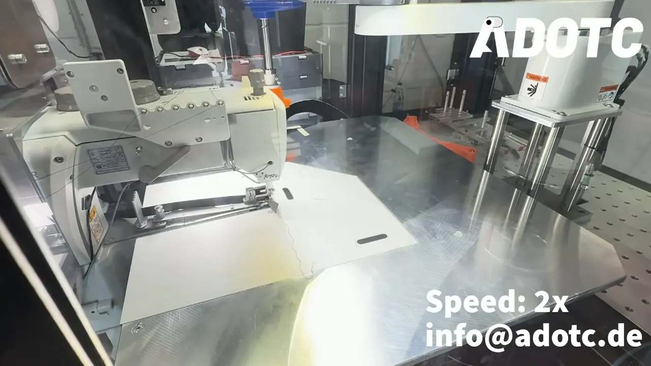 Automated binding in the ADOTC robotic sewing system